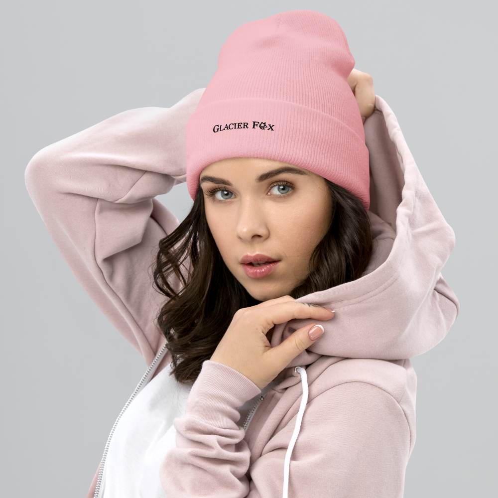 Model wearing GlacierFox Exclusive beanie with black embroidered logo and snug knit fit in Bacby Pink