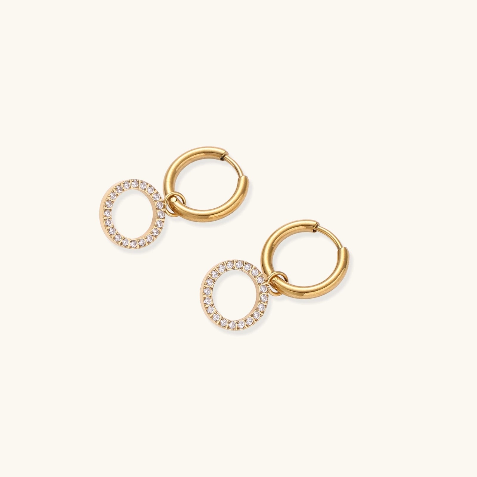 Angled view showing hoop and hanging circular charm structure