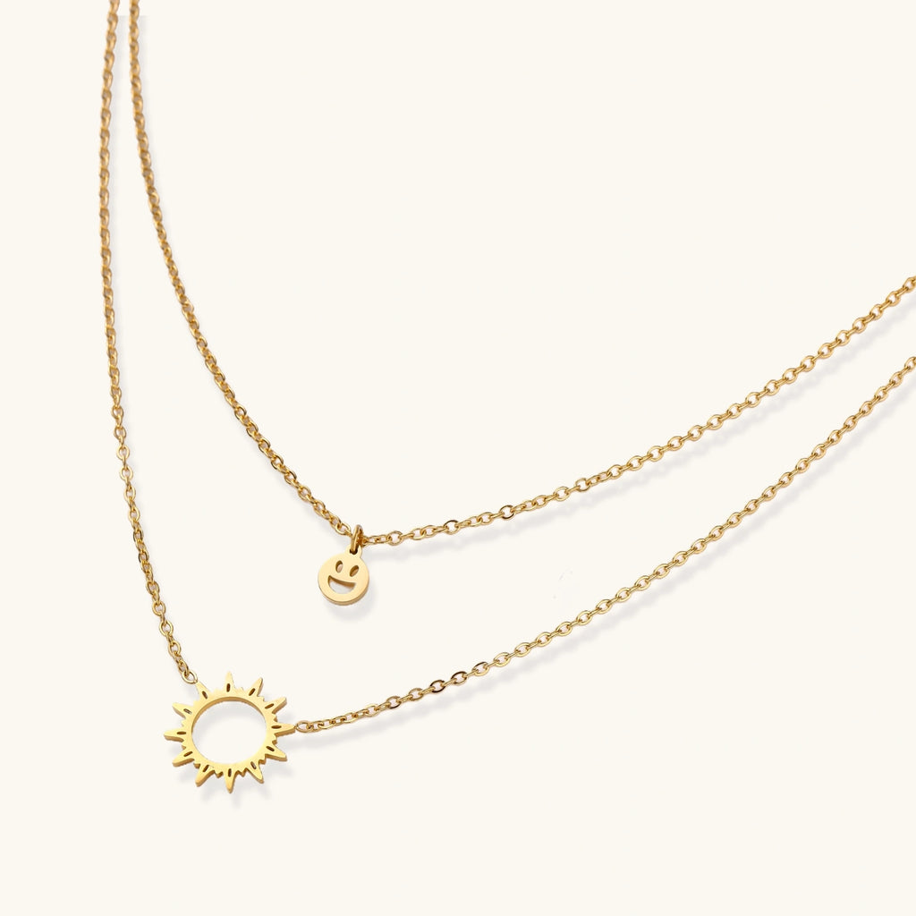 Angled view showing dual chain spacing and pendant placement