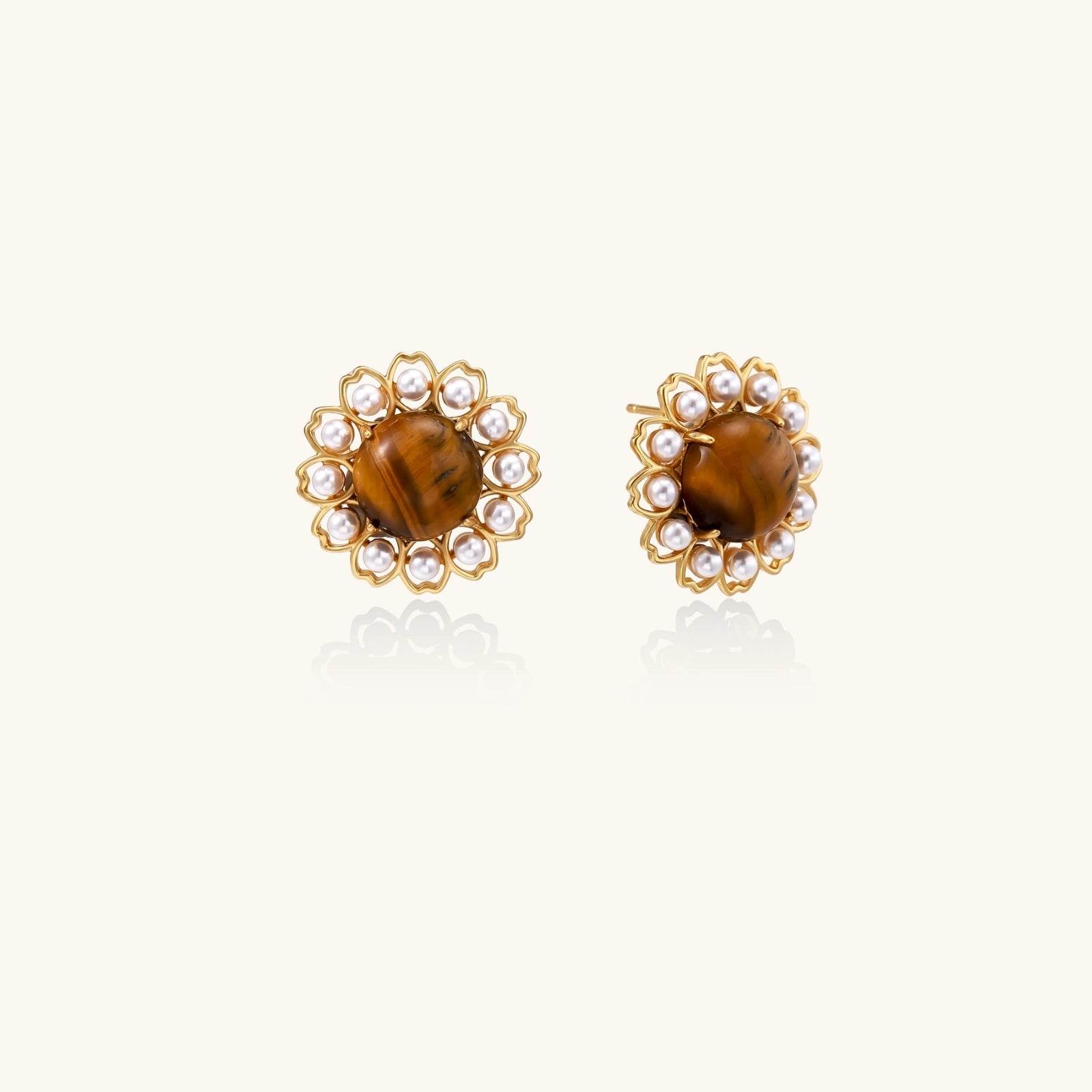 Front view of tiger’s eye stone with shell pearl halo earrings
