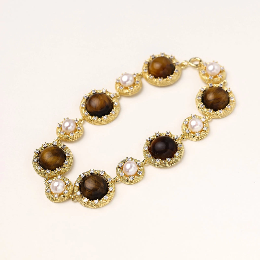 Angled view showing structure of stone and pearl links