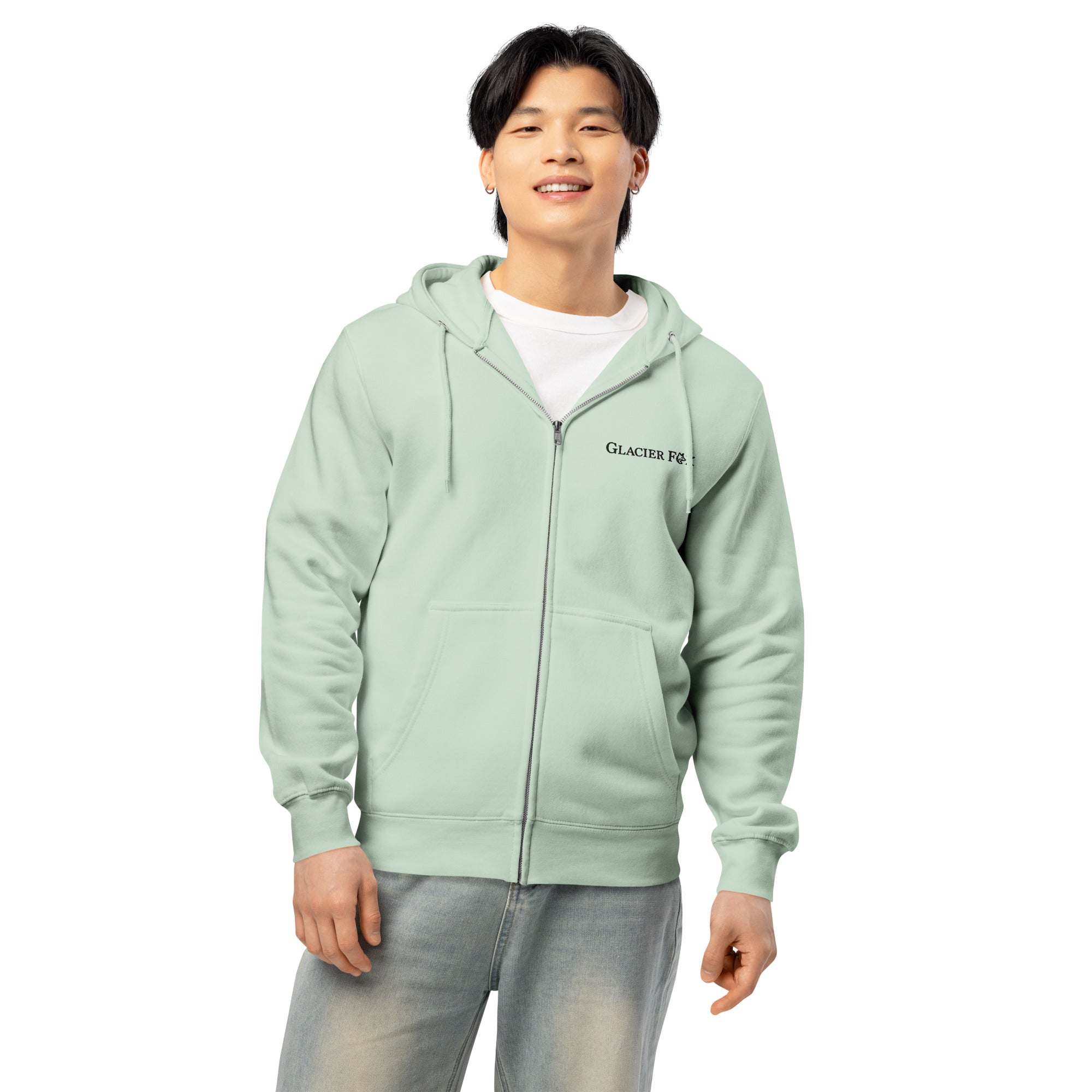 Model wearing GlacierFox men’s zip hoodie featuring a black embroidered GlacierFox logo on the front and relaxed everyday fit in Seafoam
