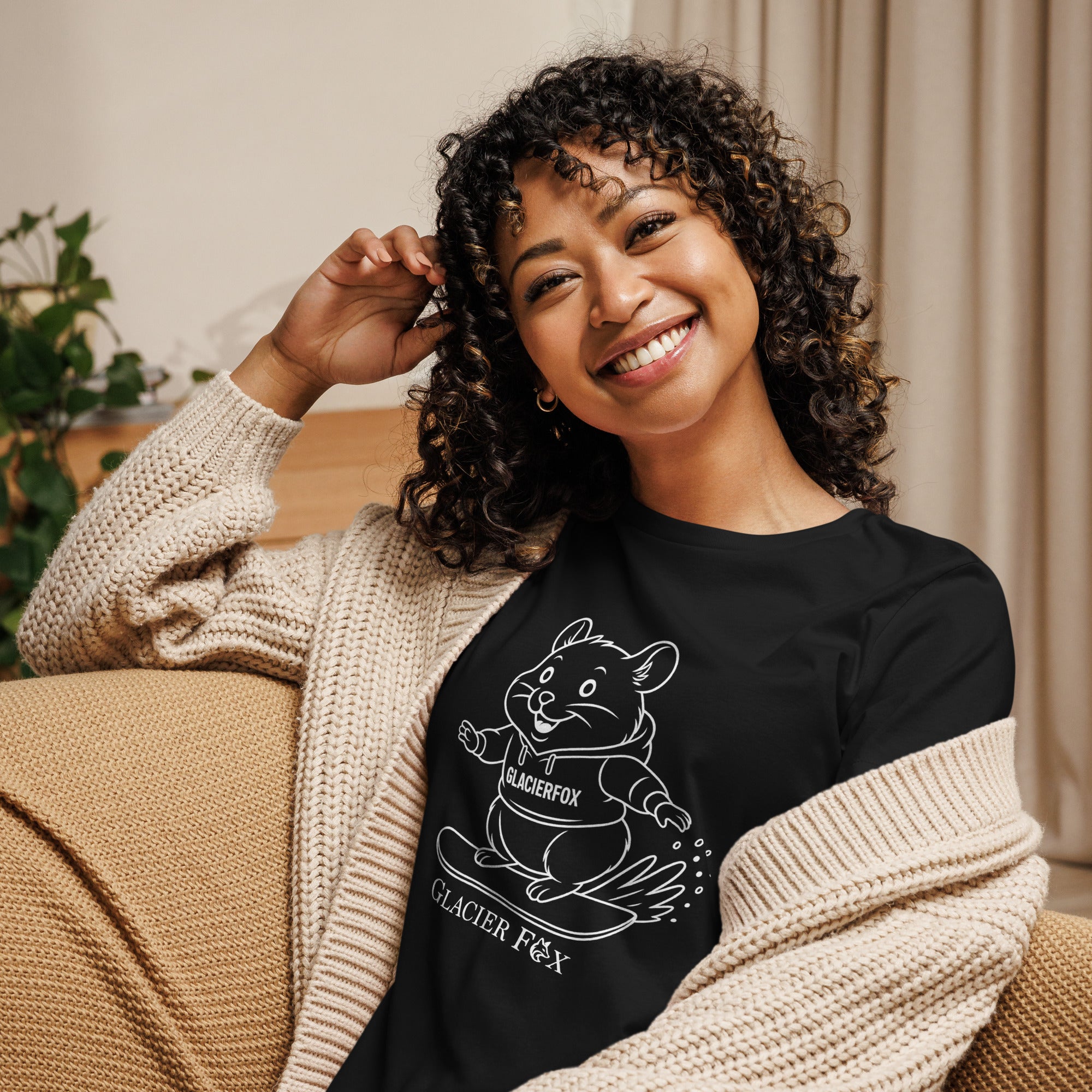 Model wearing GlacierFox Snowboarding Mr Cheeks women’s t-shirt featuring the Mr Cheeks hamster character design and relaxed modern streetwear fit in Black