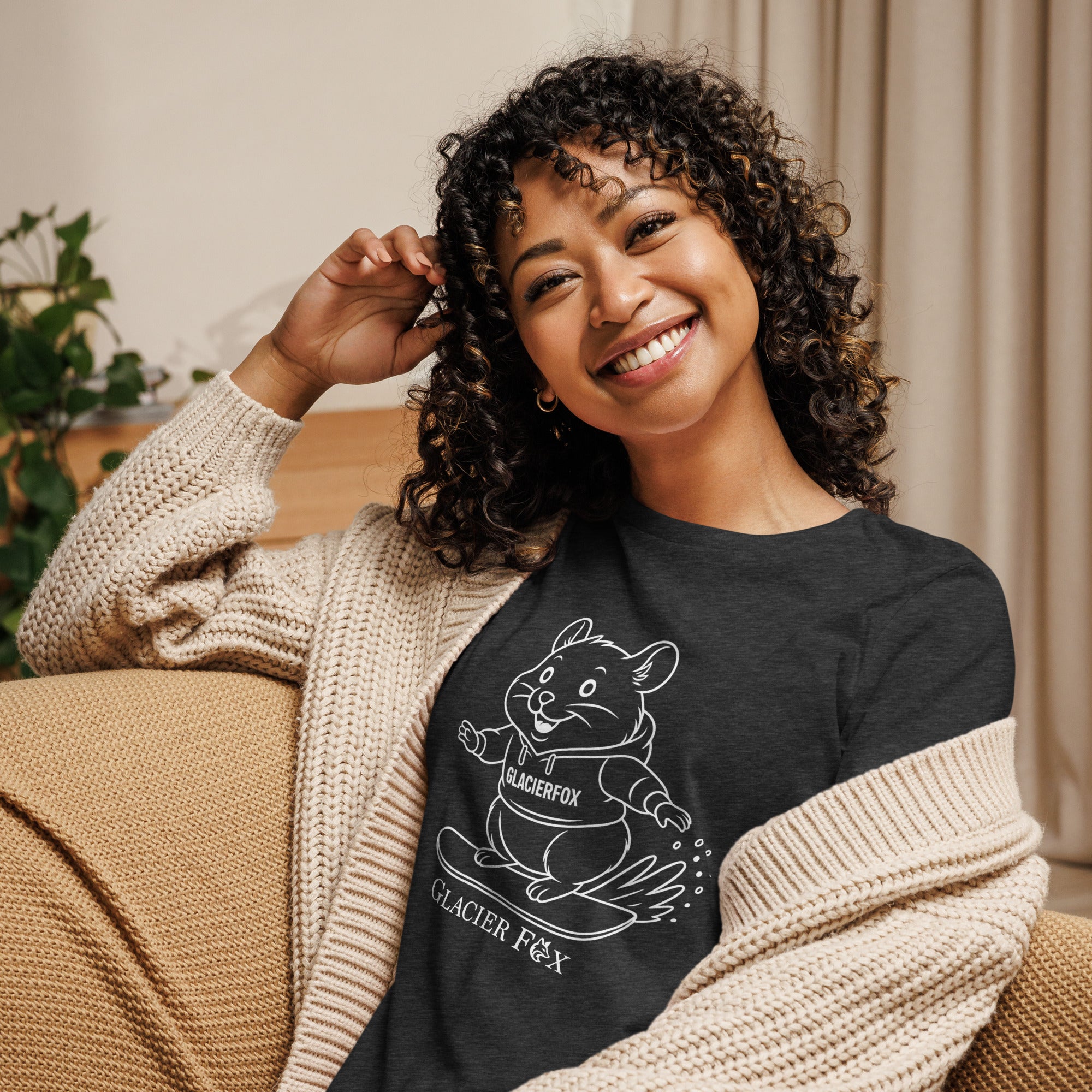 Model wearing GlacierFox Snowboarding Mr Cheeks women’s t-shirt featuring the Mr Cheeks hamster character design and relaxed modern streetwear fit in Dark Heather Grey