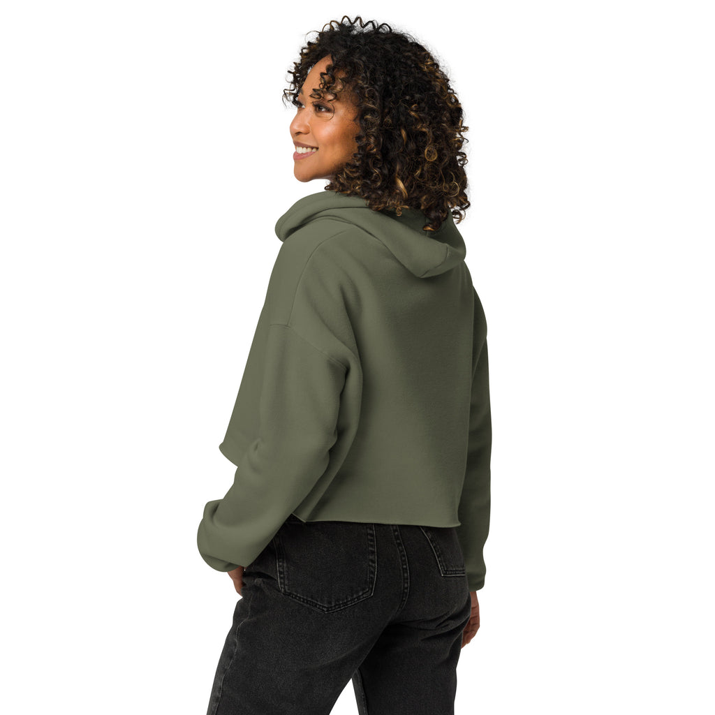 Back view of model wearing GlacierFox Surfing Gilbert women’s crop hoodie showing clean minimalist back, cropped silhouette, and streetwear fit in Military Green