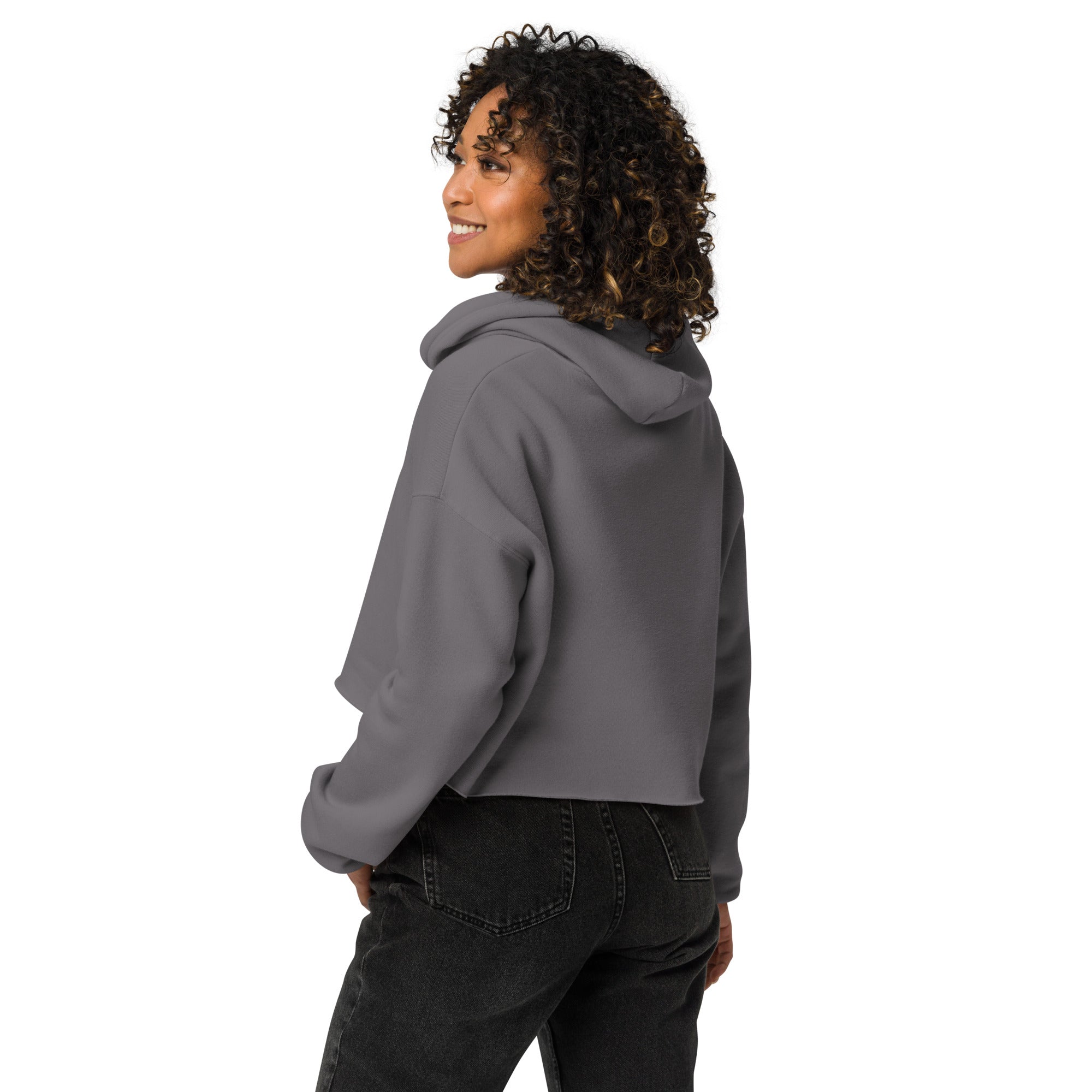 Back view of model wearing GlacierFox Surfing Gilbert women’s crop hoodie showing clean minimalist back, cropped silhouette, and streetwear fit in Storm