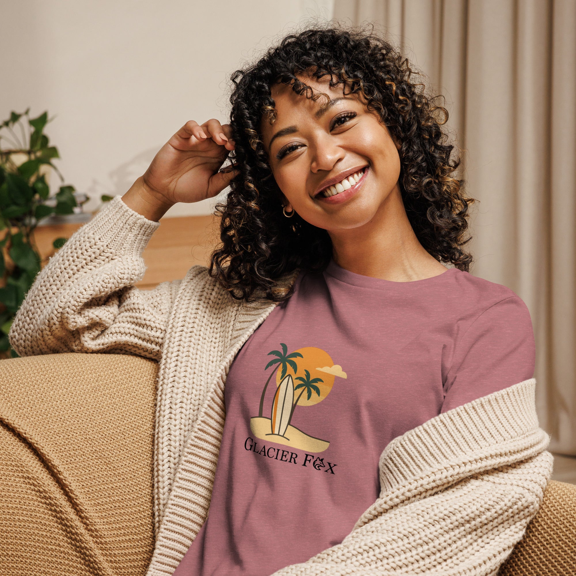 Model wearing GlacierFox women’s Beach t-shirt featuring a beach-inspired design with the GlacierFox logo on the front and relaxed streetwear fit in Heather Mauvre