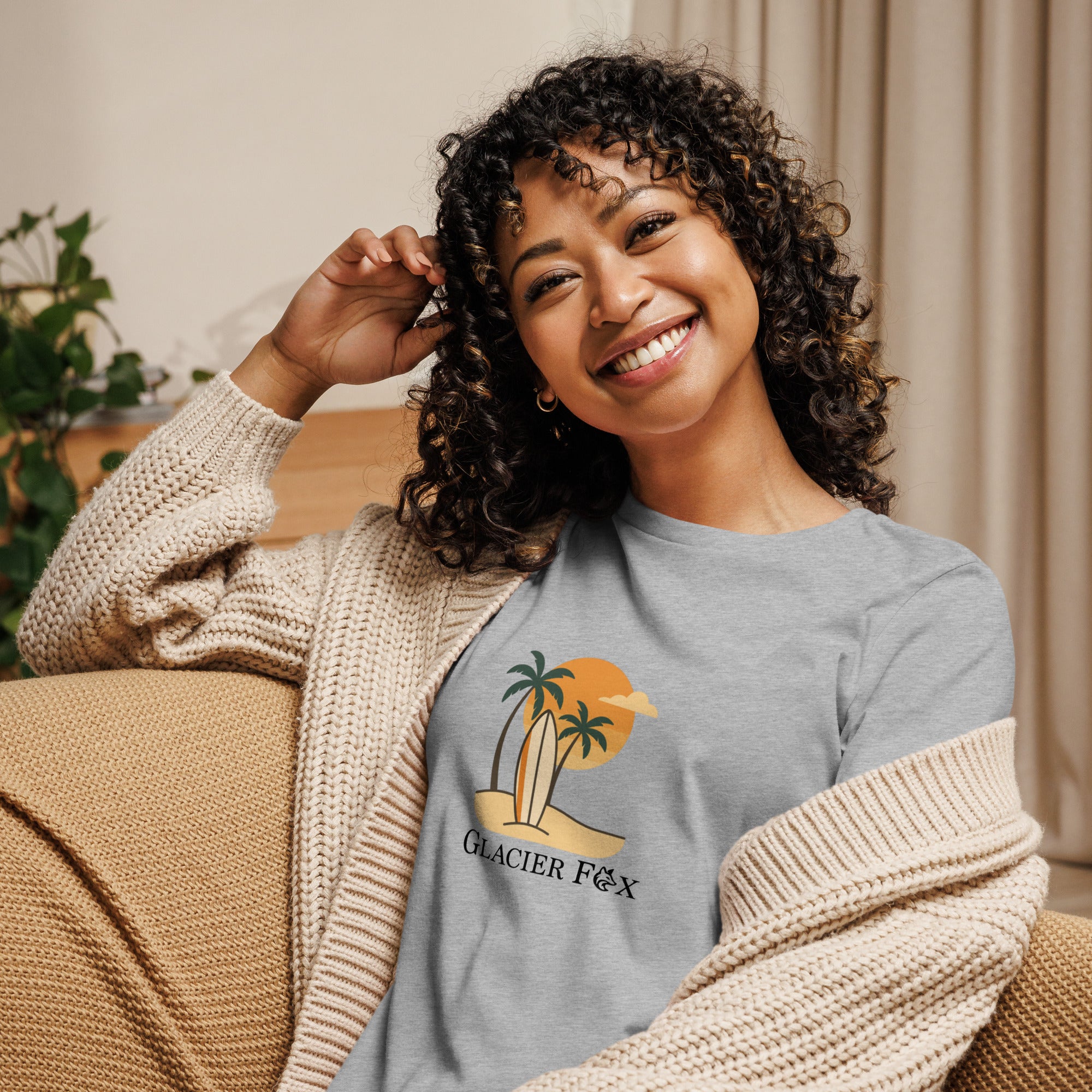 Model wearing GlacierFox women’s Beach t-shirt featuring a beach-inspired design with the GlacierFox logo on the front and relaxed streetwear fit in Heather