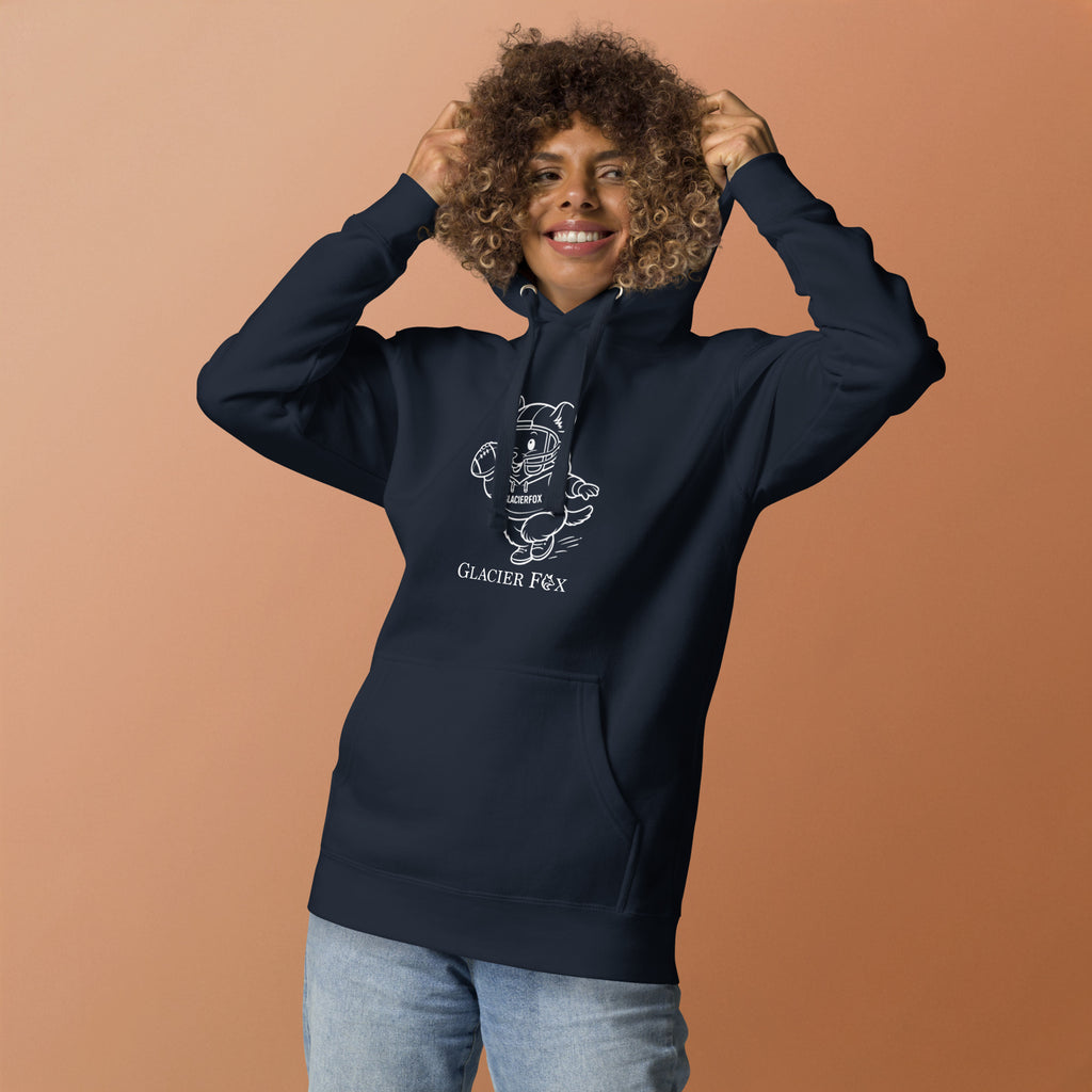 Model wearing GlacierFox women’s Mr Cheeks quarterback hoodie featuring the Mr Cheeks character graphic on the front and relaxed streetwear fit in Navy