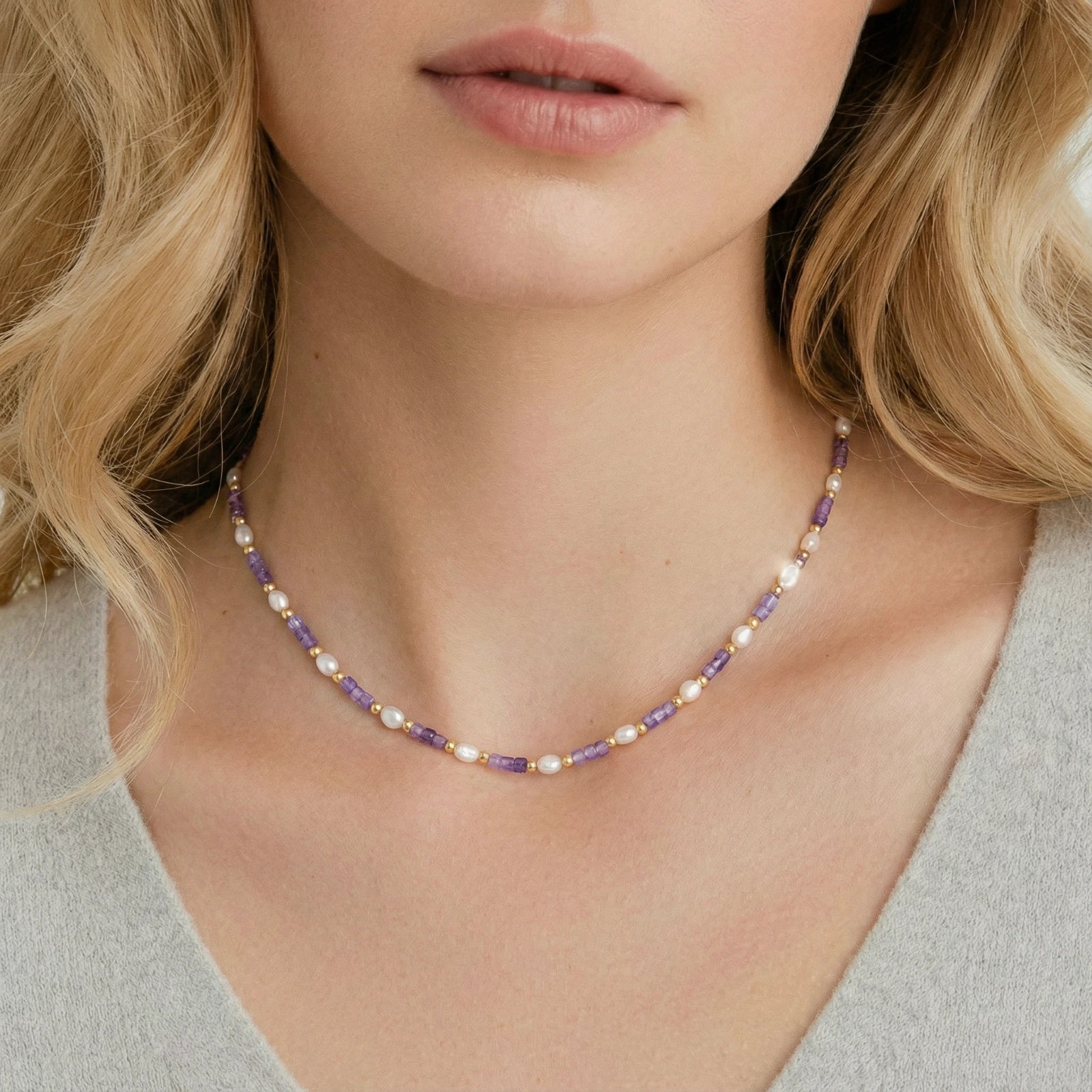 Model wearing GlacierFox Elements amethyst zirconia and pearl beaded necklace in gold vermeil